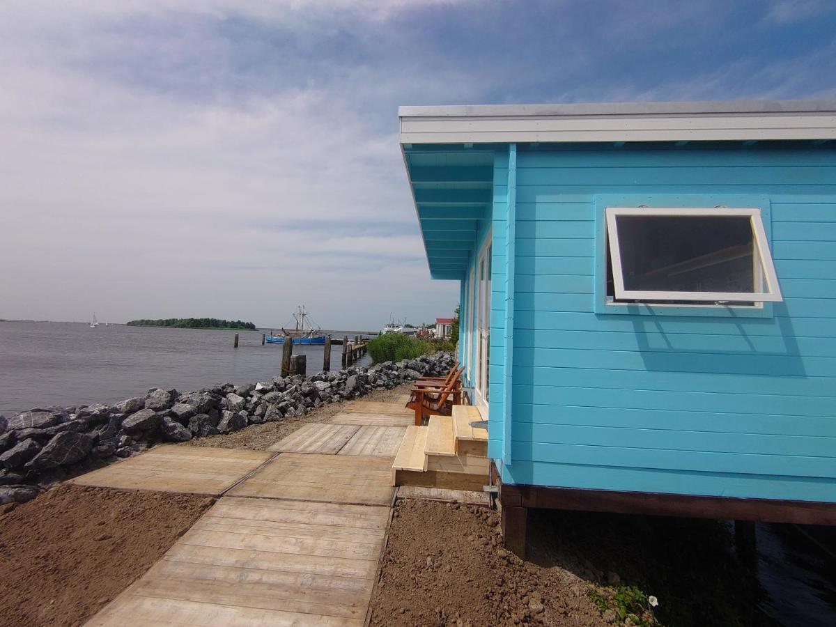 Waterhuisjes Op De Pier Van Lauwersmeerplezier! ラウエルウオーフ エクステリア 写真