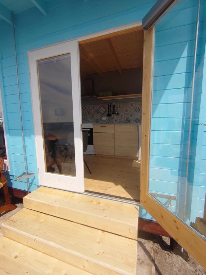 Waterhuisjes Op De Pier Van Lauwersmeerplezier! ラウエルウオーフ エクステリア 写真
